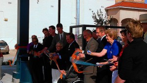 Elected officials cut the ribbon to dedicate the new Allen Roth Transit Center in Mission, Kansas. July 1, 2013.