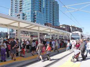 New Union Station light rail facility on first day of operations of the "West Line" light rail. Note new mixed use development in background.